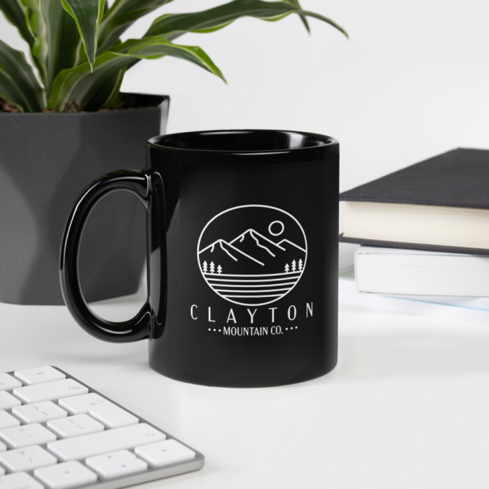 Clayton Mountain Co. - Clayton, GA - Clayton Mountain Co. - Clayton, GA Logo Mug | Black Ceramic Coffee Mug | North Georgia Inspired - Black Glossy Mug Black 11 Oz Handle On Left