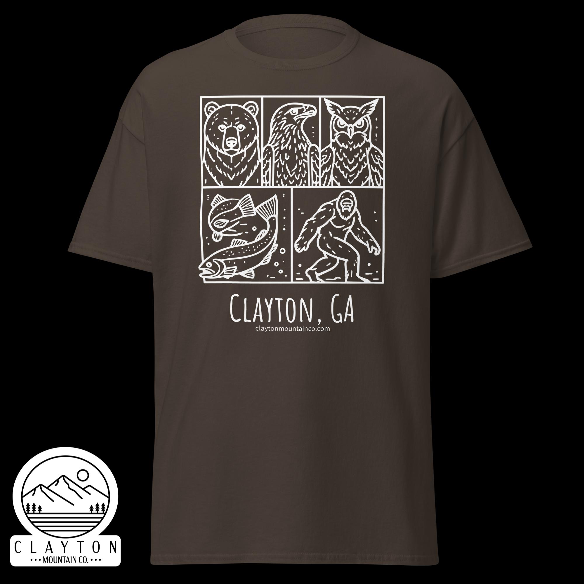 unisex-classic-tee-dark-chocolate-front-6a2e6635a9737jpg - Clayton Mountain Co. Brown tee with white comic-style panels showing a bear, a bird, a fish, and a figure, plus 'Clayton Mountain Co.' and website at bottom