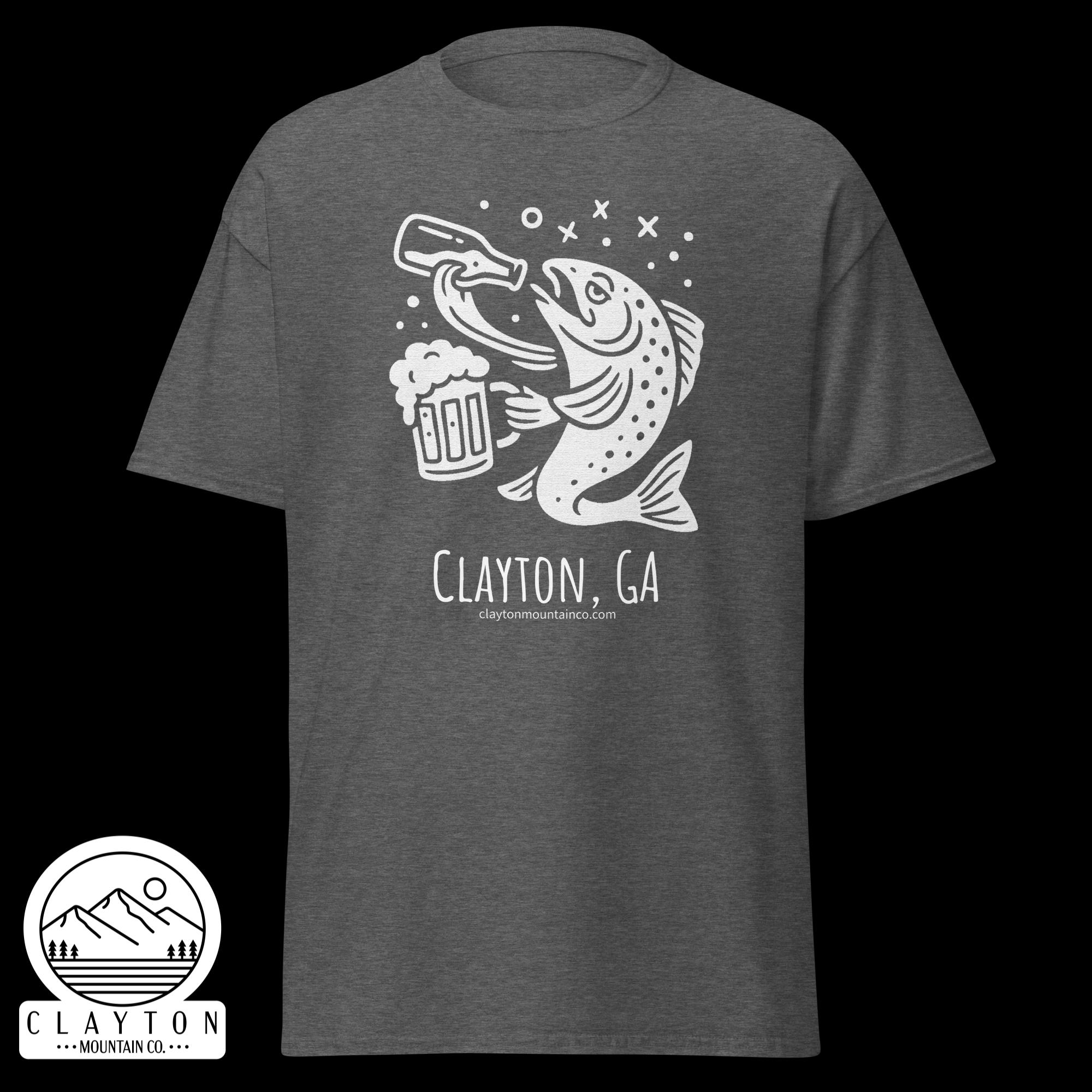 unisex-classic-tee-dark-heather-front-6a2e5d899f160jpg - Clayton Mountain Co. Gray tee with a white fish graphic holding a beer mug, bubbles around, text reads 'Clayton, GA' and website claytonmountainco.com.