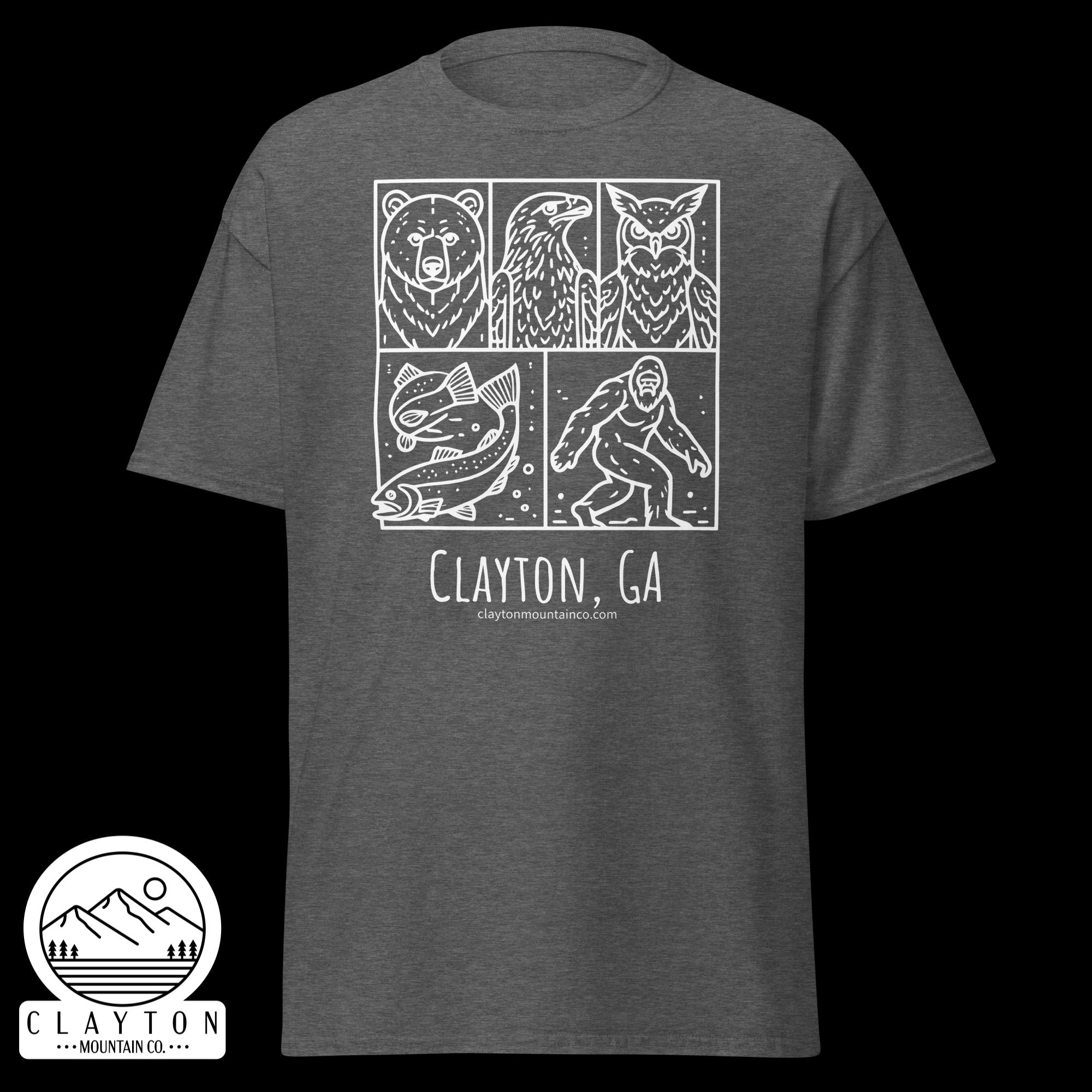 unisex-classic-tee-dark-heather-front-6a2e6635aa9e8jpg - Clayton Mountain Co. Gray T-shirt featuring a white line-art panel design with a bear, a bird, an owl and a fish; text below reads 'Clayton, GA' and 'claytonmountainco.com'