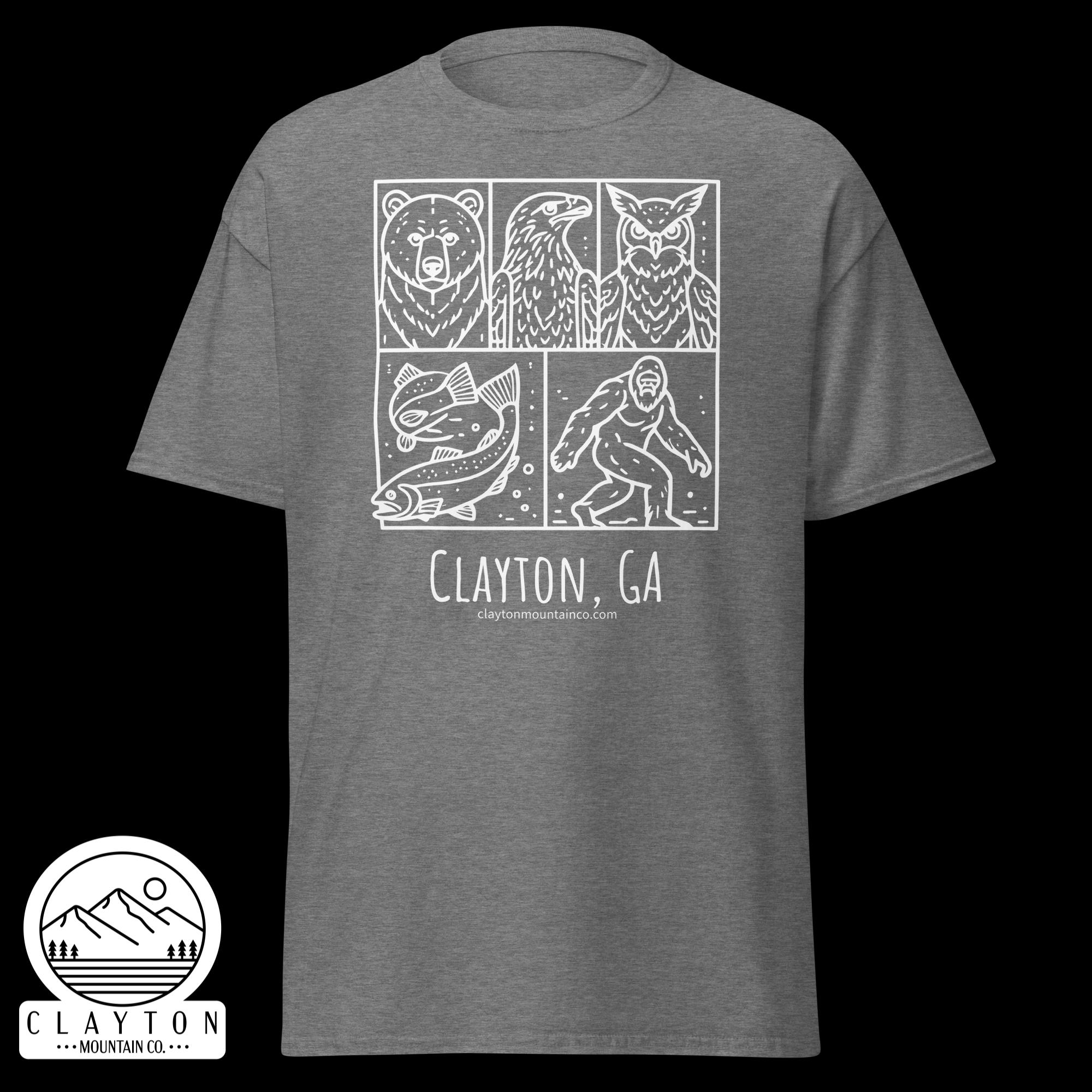 unisex-classic-tee-graphite-heather-front-6a2e6635b7400jpg - Clayton Mountain Co. Gray T-shirt with a white three-panel line-art graphic: bear, bird (eagle/owl), and owl; text reads Clayton, GA below the image edge.