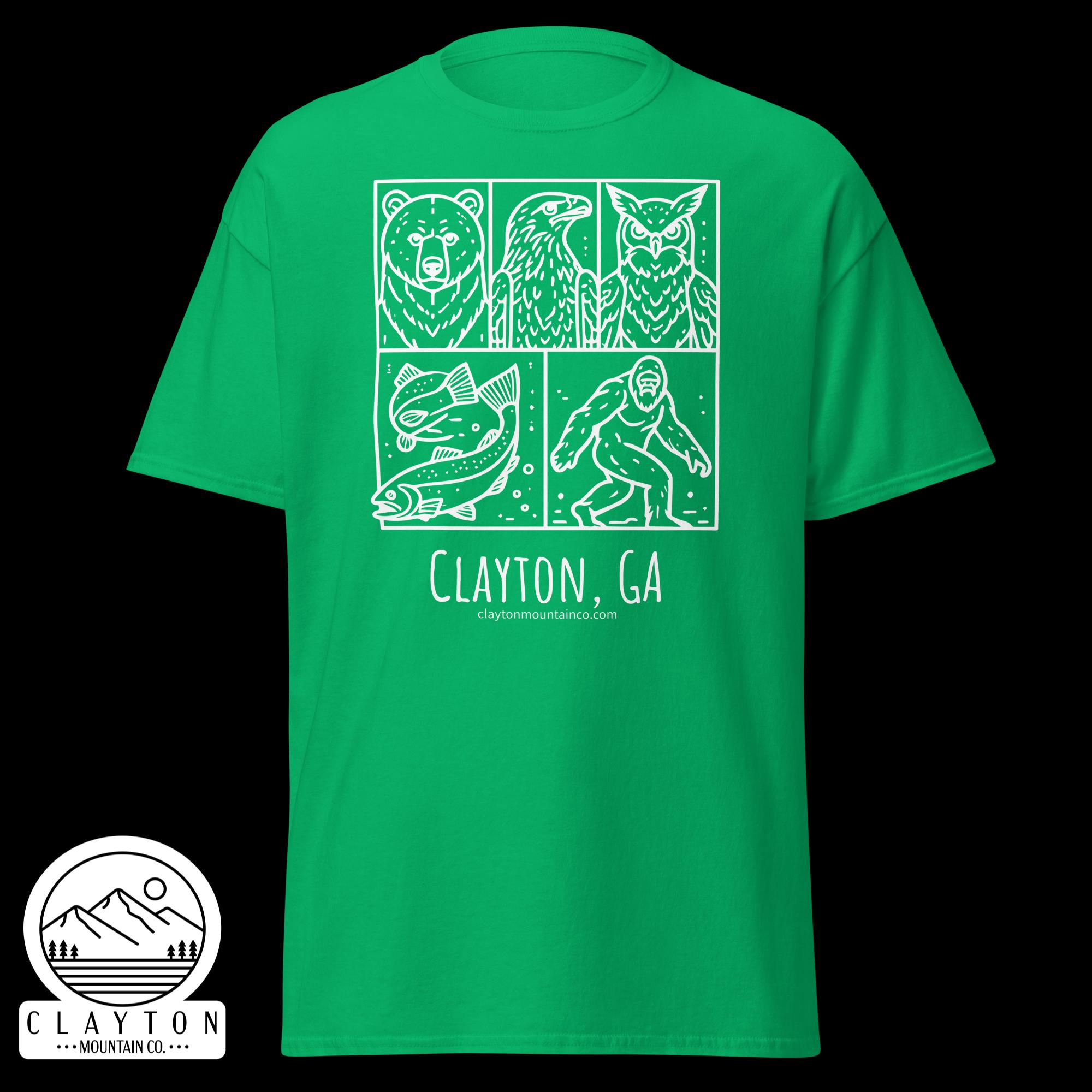 unisex-classic-tee-irish-green-front-6a2e6635acf67jpg - Clayton Mountain Co. Green T-shirt with white four-panel graphic of wildlife (bear, fish, bird) and a round mountain logo, Clayton Mountain Co., Clayton, GA.