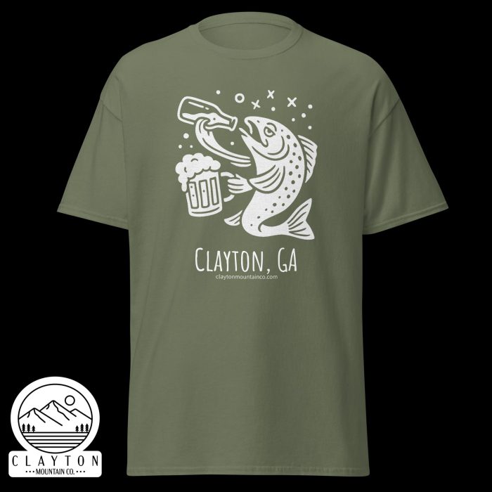unisex-classic-tee-military-green-front-6a2e5d898fc6bjpg - Clayton Mountain Co. Olive green T‑shirt with a white trout illustration holding a beer mug and Clayton, GA text with a mountain logo in the corner.